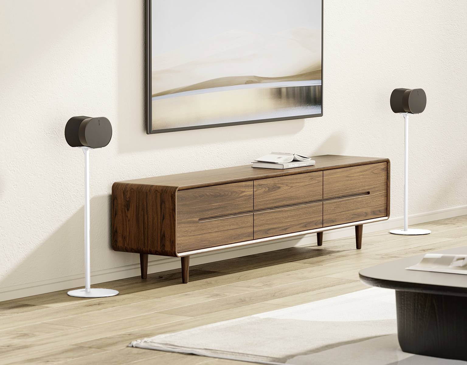 Wooden chest of drawers with two speakers on stands, modern interior design, minimalist with landscape painting.