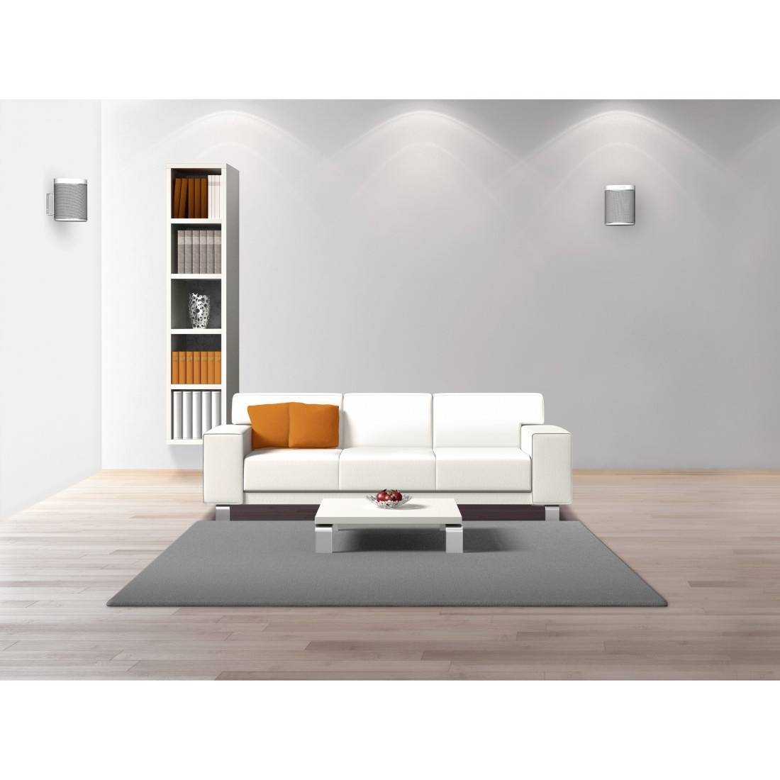 Living room with a white sofa, orange cushion, grey carpet and low table on wooden flooring. To the left is a bookshelf.