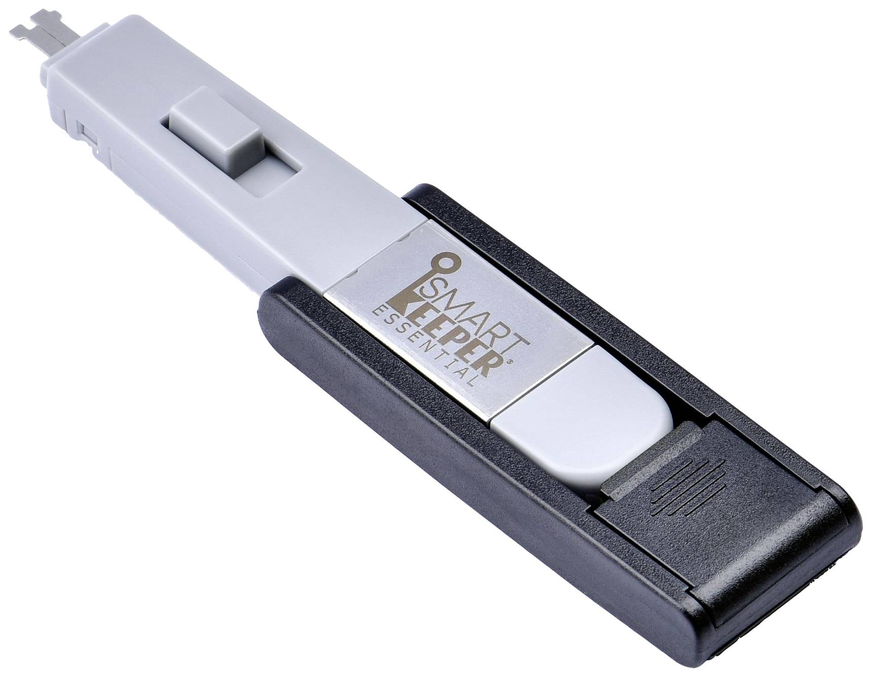 A USB security lock in grey and black, marked with 'Smart Keeper Essential'. It blocks USB ports to prevent unauthorised access.