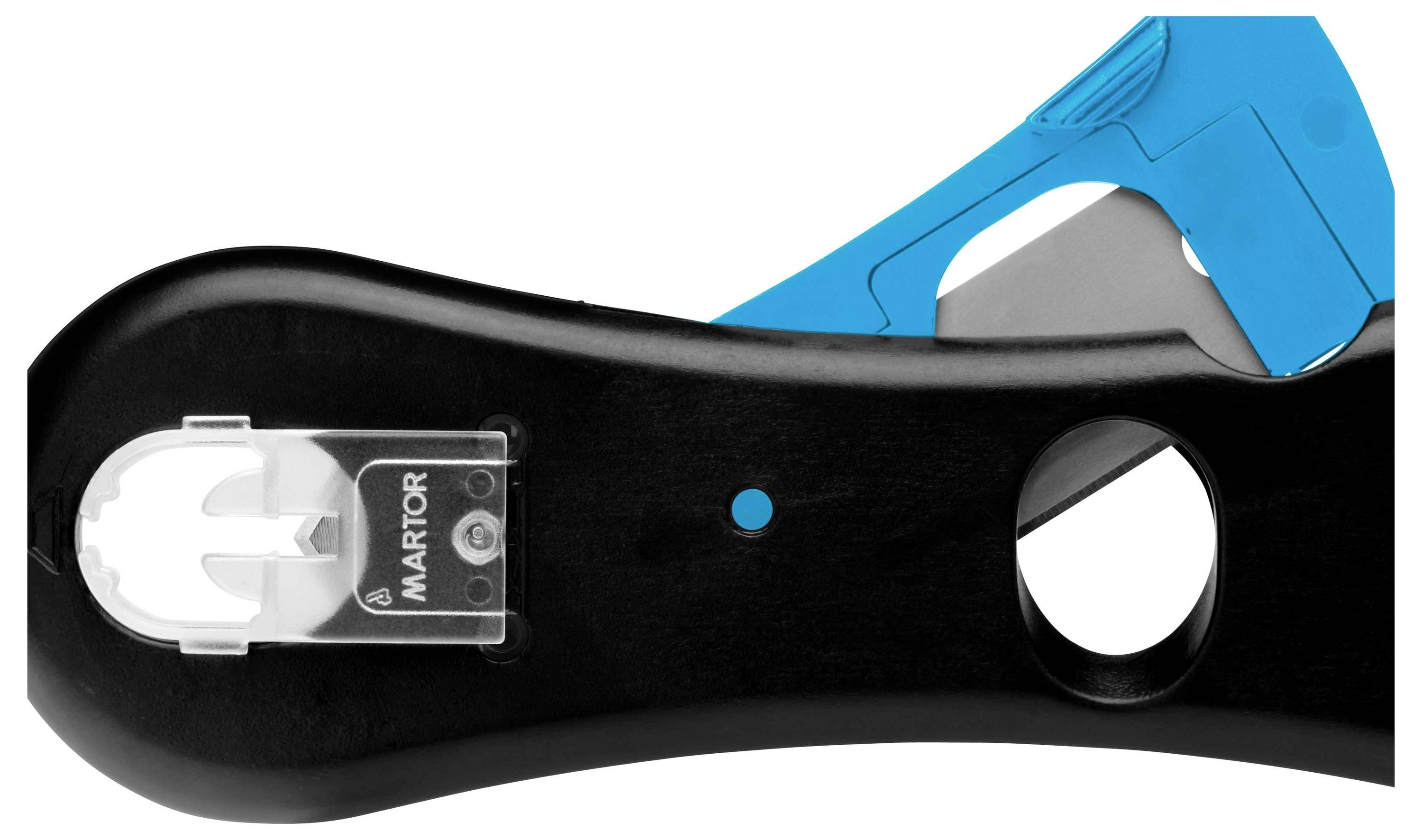Black and blue cutting tool with visible blade. Features a push-button mechanism and a Martor logo.