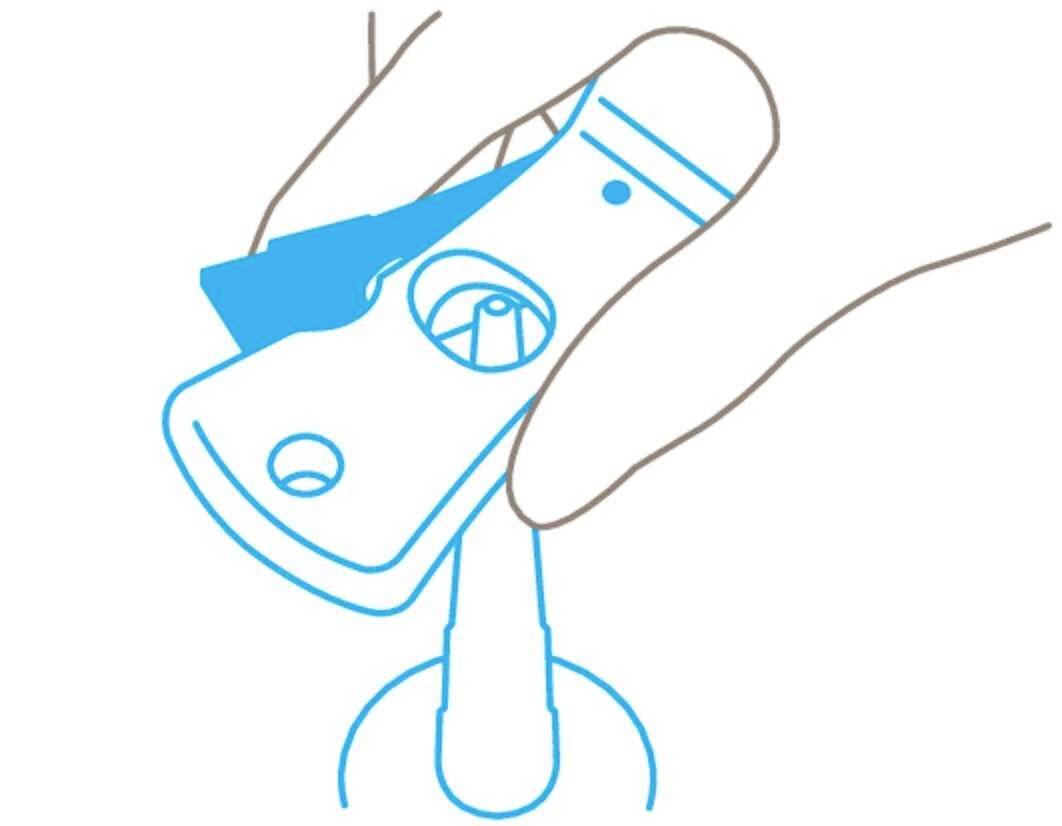A hand is holding a rapid test instruction, showing the step-by-step procedure for use.