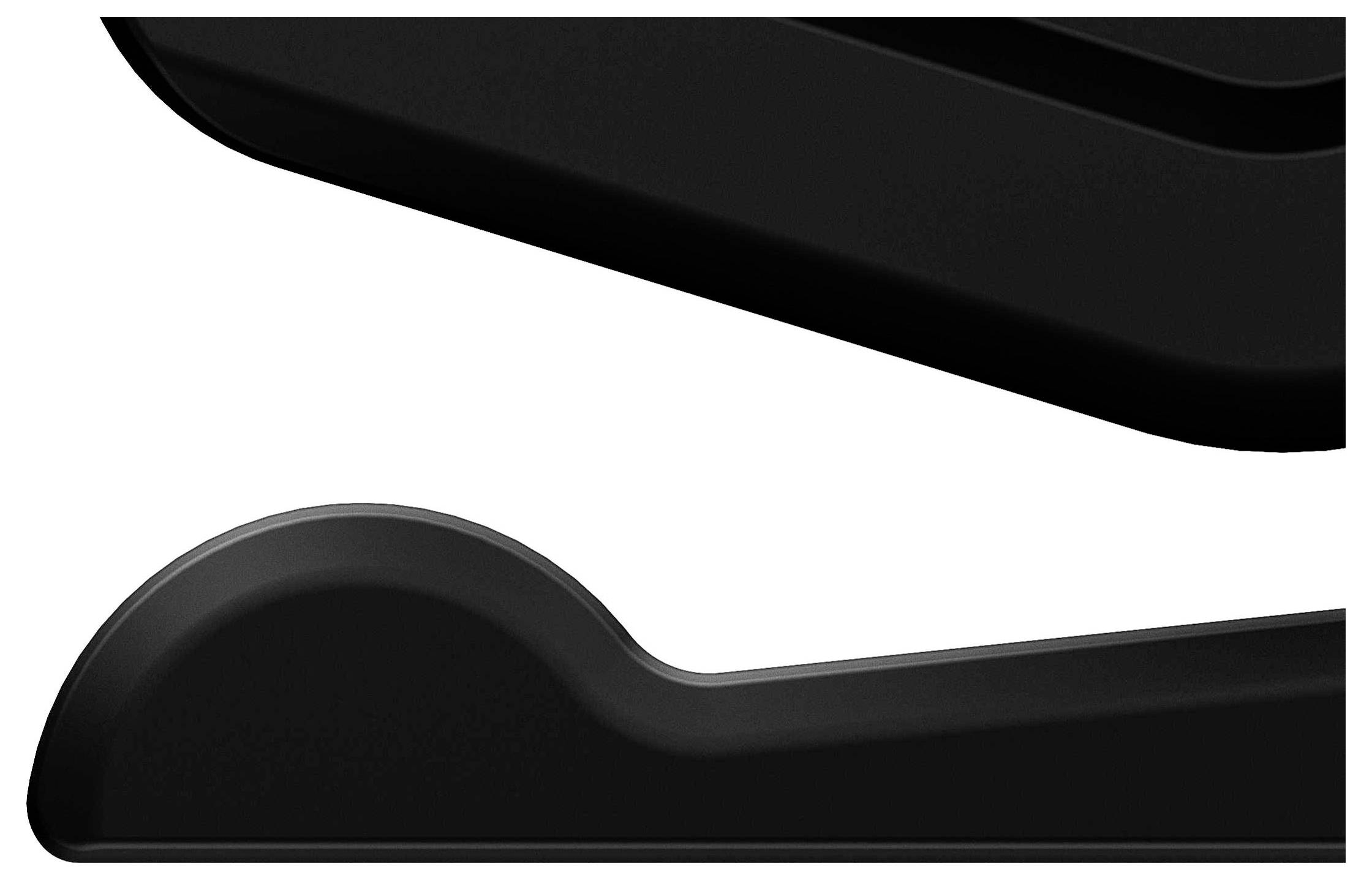 Close-up of two black, rounded, elongated objects placed against each other on a white background.