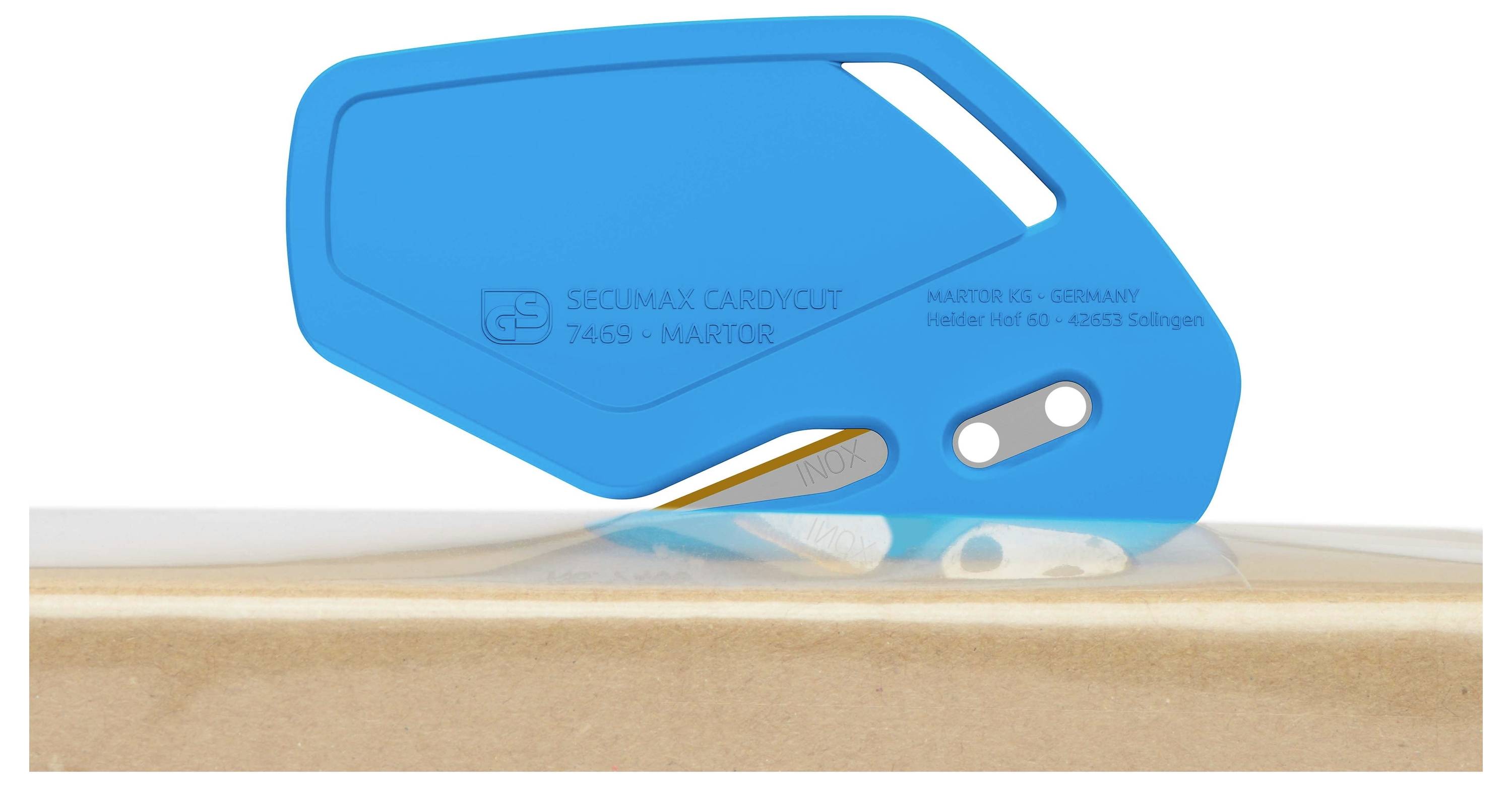 A blue safety cardboard cutter, model SECUMAX CARDYCUT, cuts the top of a cardboard box.