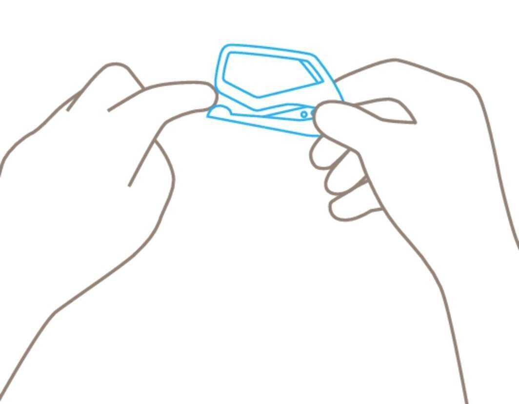 Two hands are holding a small, blue-bordered object, possibly a screen display, in a line.