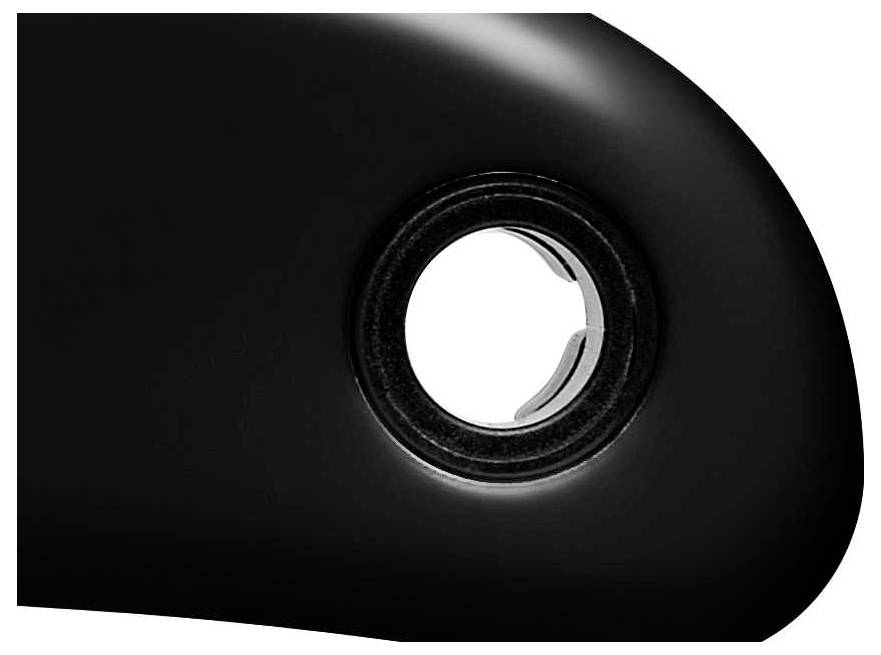 A black bicycle component with a round hole in the centre, potentially part of a pedal or a crank.