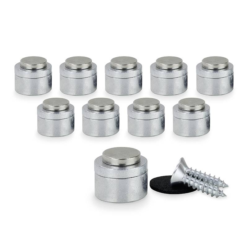Ten silver wall spacers lined up side by side, with a screw and washer in the foreground. Ideal for secure wall mounting.