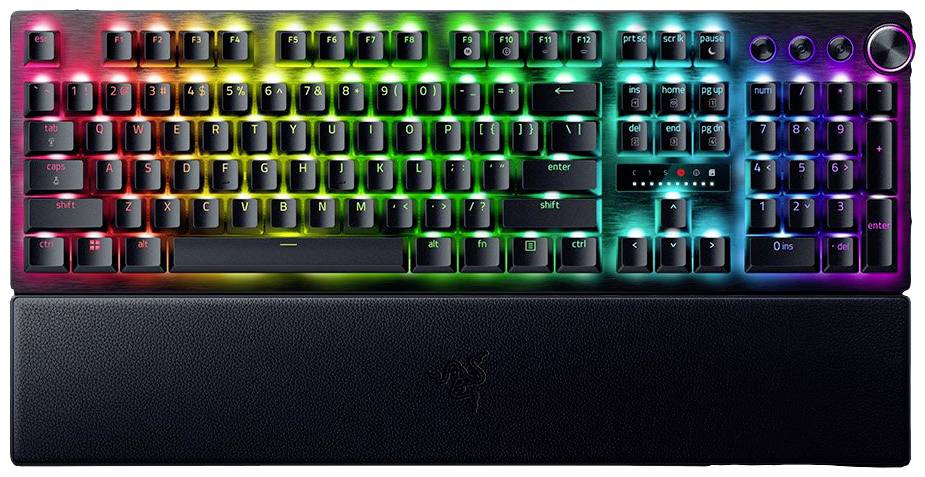 Gaming keyboard with RGB lighting in rainbow colours, wrist rest, and mechanical keys.