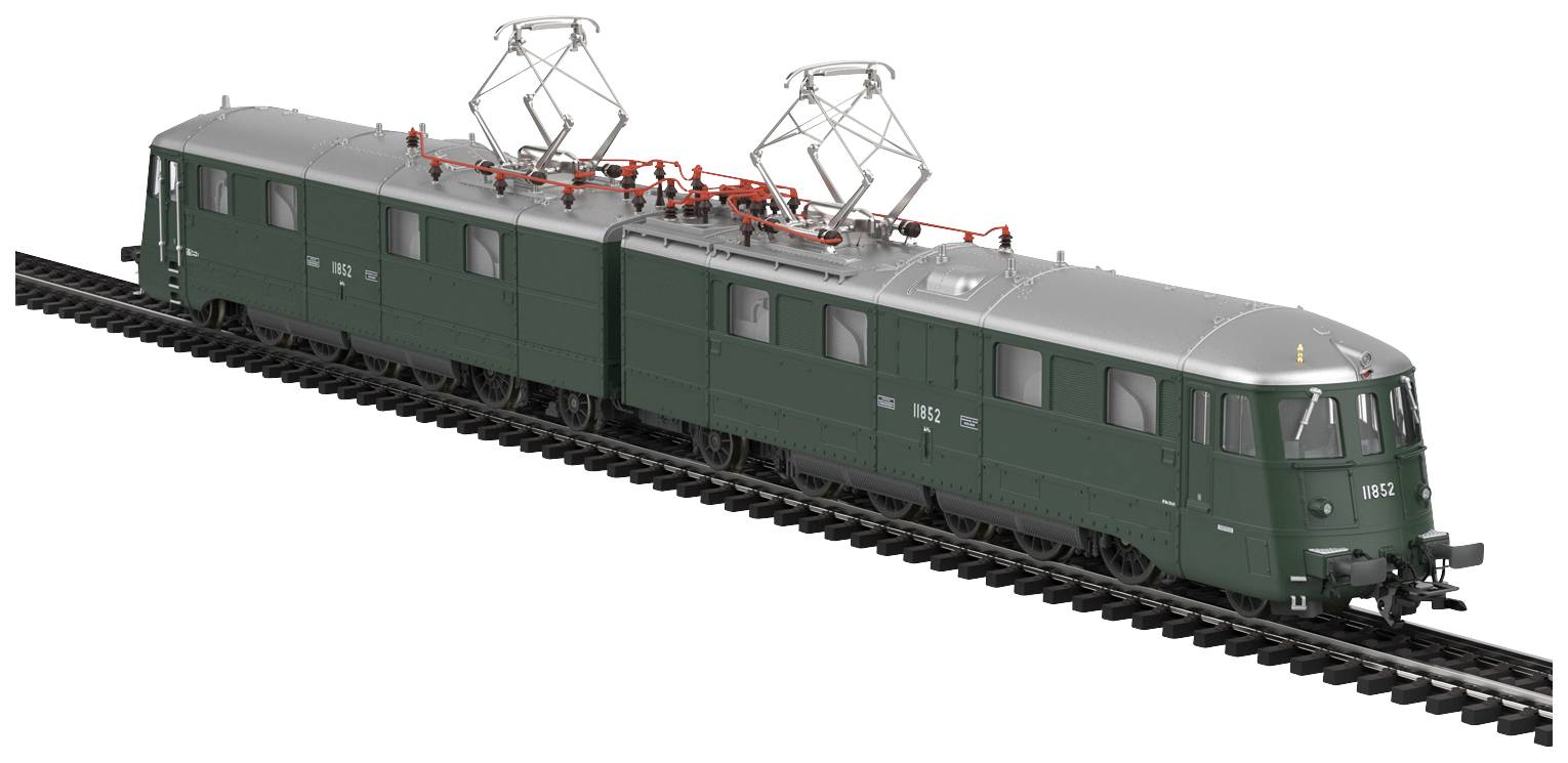 A green, intricately modelled train with two carriages on tracks, depicts a historic electric locomotive with pantographs on its roof.