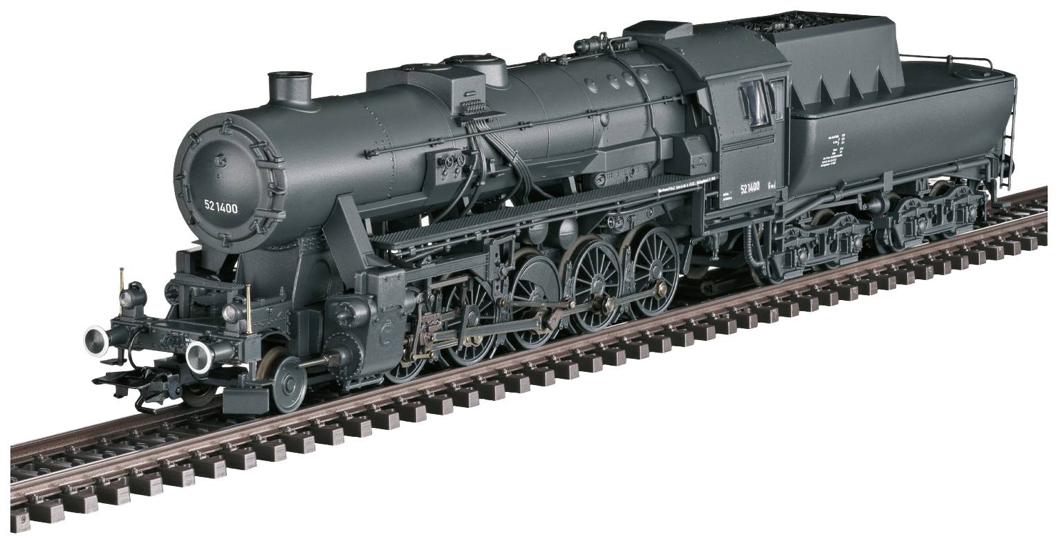 A black steam locomotive in model railway scale stands on a track. It has many details, such as wheels and buffers.