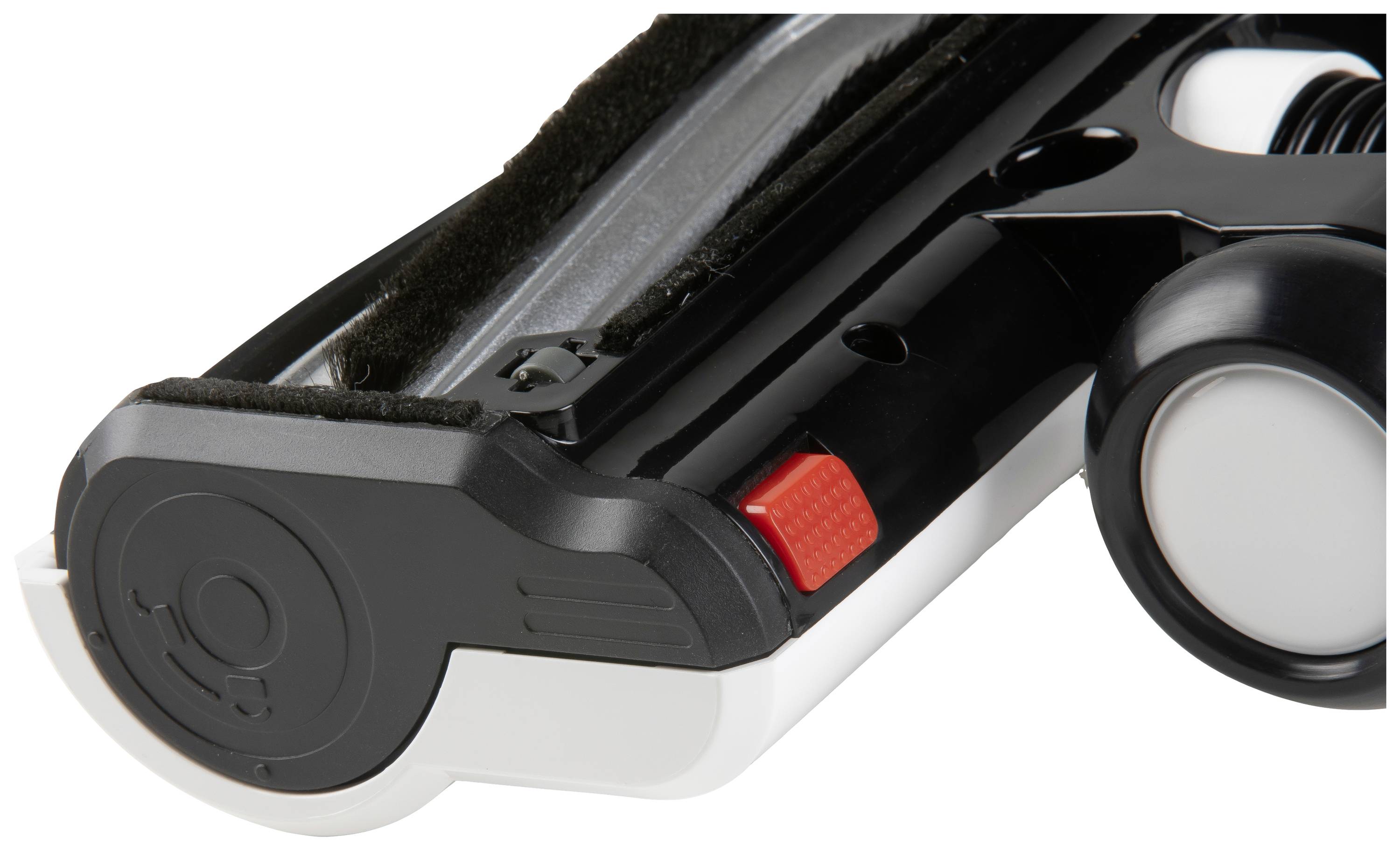 Close-up of a rotary cutter in black and white with a red switch. Suitable for precise cutting.