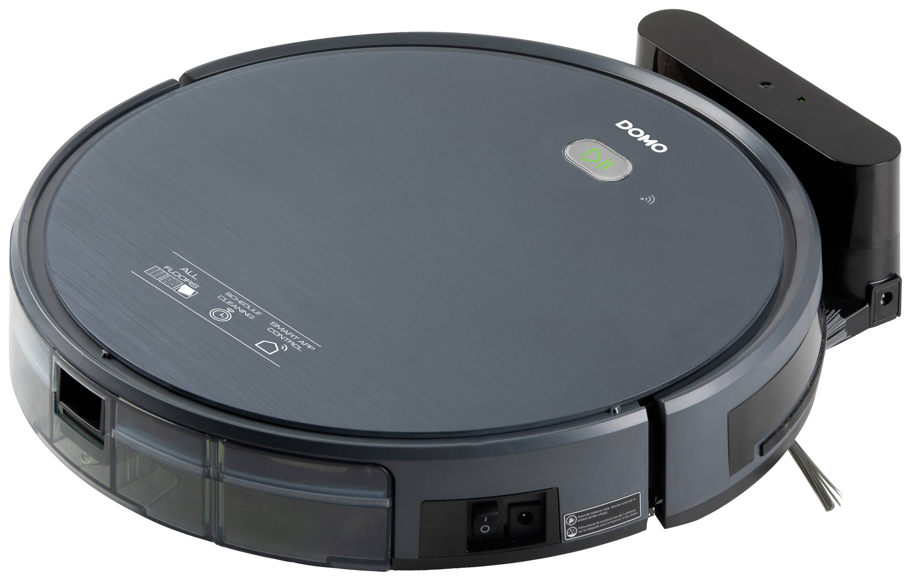 A round, blue robotic vacuum cleaner on its charging station, with a button and the label 'Domo' on the top surface.