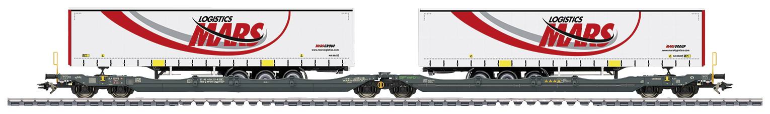Two modern freight wagons on railway tracks, loaded with 'Marc' company lorry trailers in red and white colours.