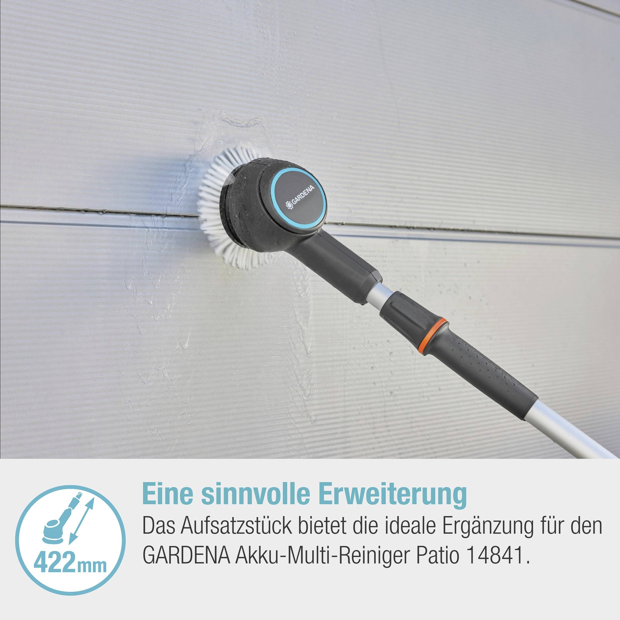 A brush attachment with the Gardena logo on a wall. Text describes the extension for the Gardena Battery-Powered Multi-Cleaner Patio 14841.