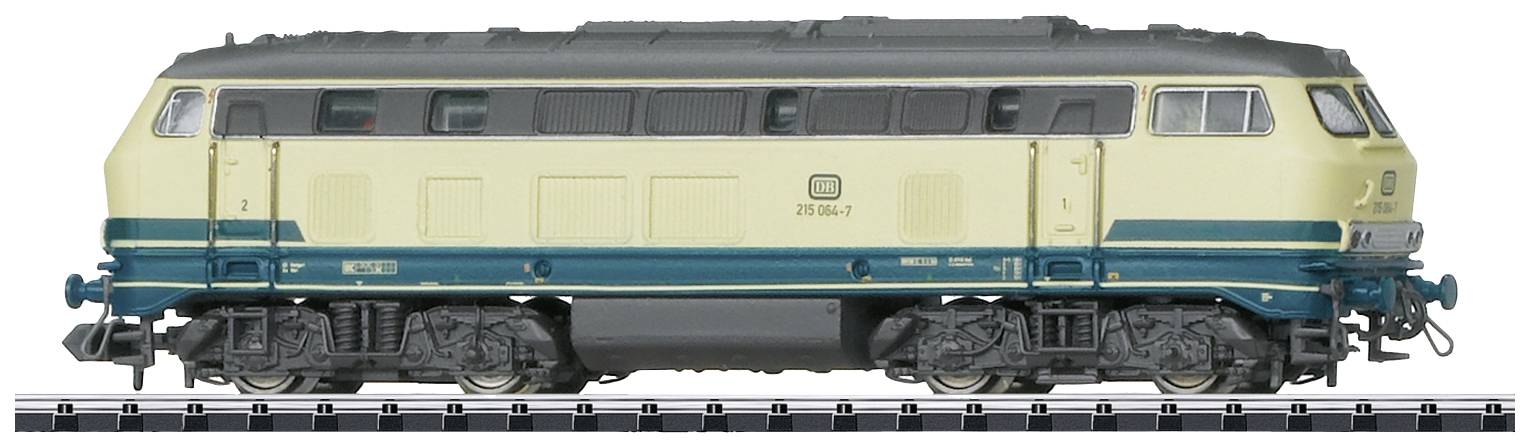 A model of a two-tone diesel locomotive with the label 'DB 218 497-7' on its sides, standing on a track.
