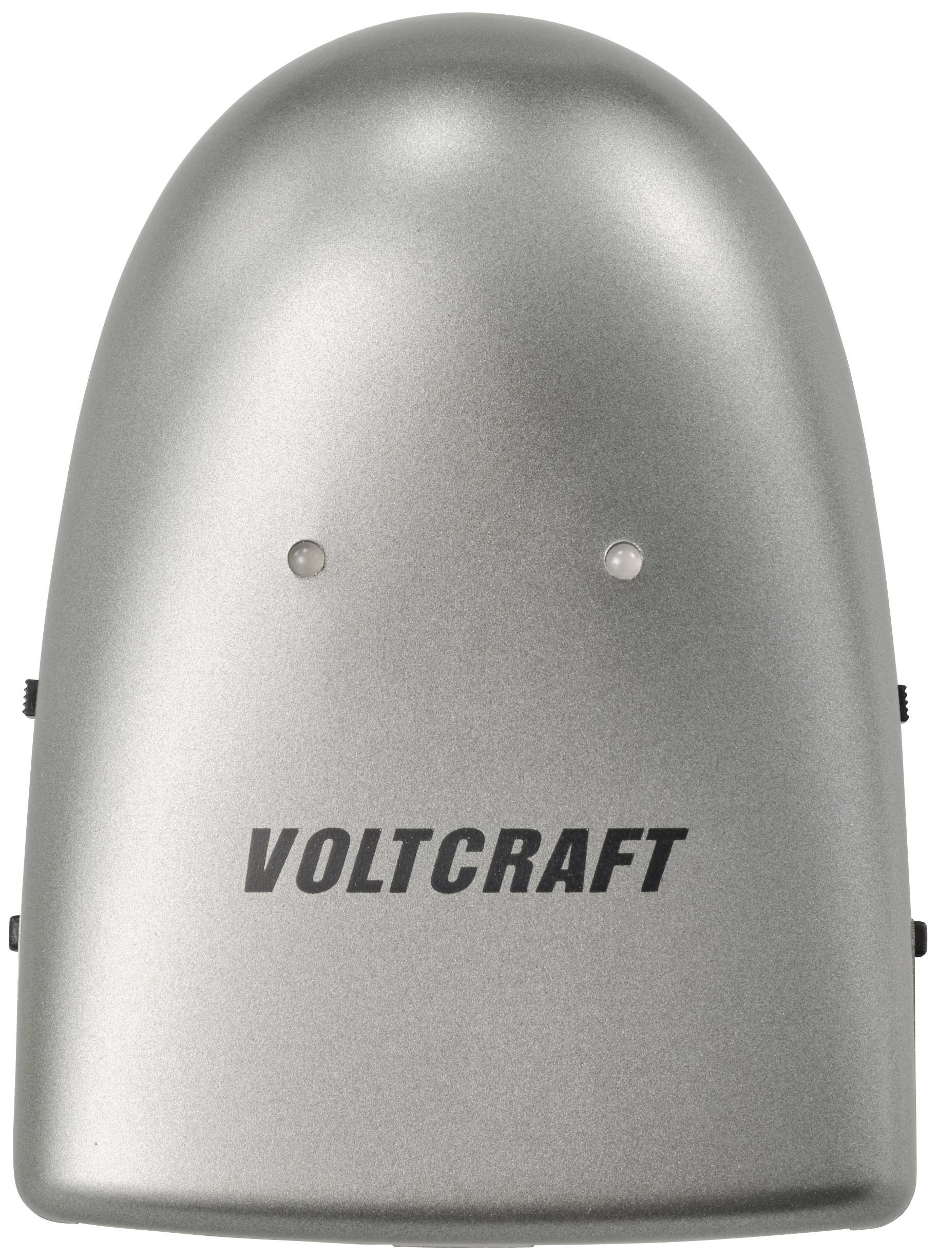 A silver device with two lights and the inscription 'Voltcraft' on the front.