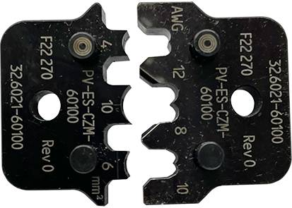 Electrically insulated black cable clamps with the inscription 'PV-ES-CZM-60100' and 'AWG' in a close-up view.