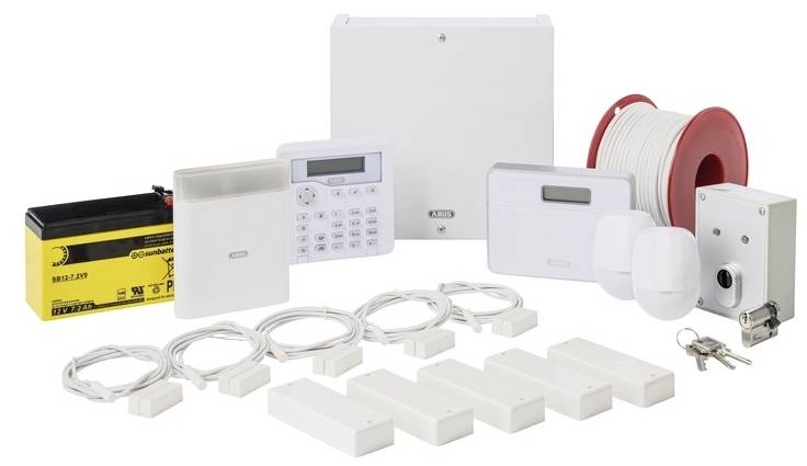An alarm system set comprising sensors, a central control unit, a battery and accessories for installation.