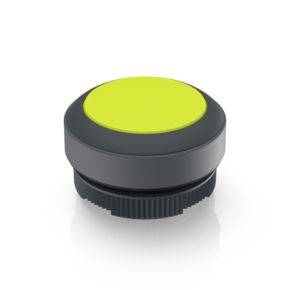 A large, round, yellow button with black edges, placed on a surface.