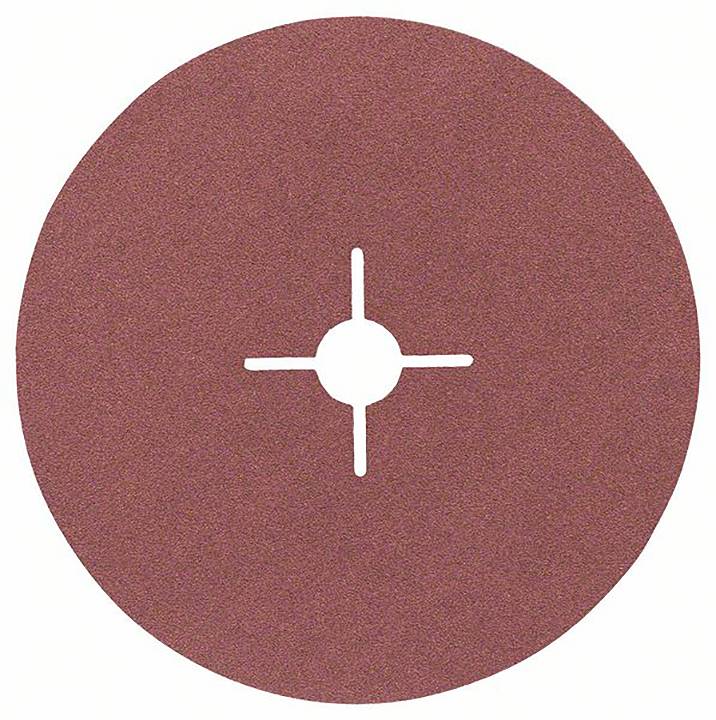 A round red grinding wheel shows a central hole with a cross-shaped slot, typical of industrial grinding tools.