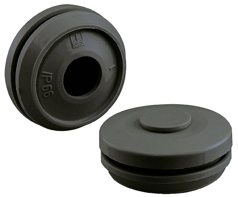 Two black, round sealing plugs with embossed 'IP66' marking, suitable for use in waterproof applications.