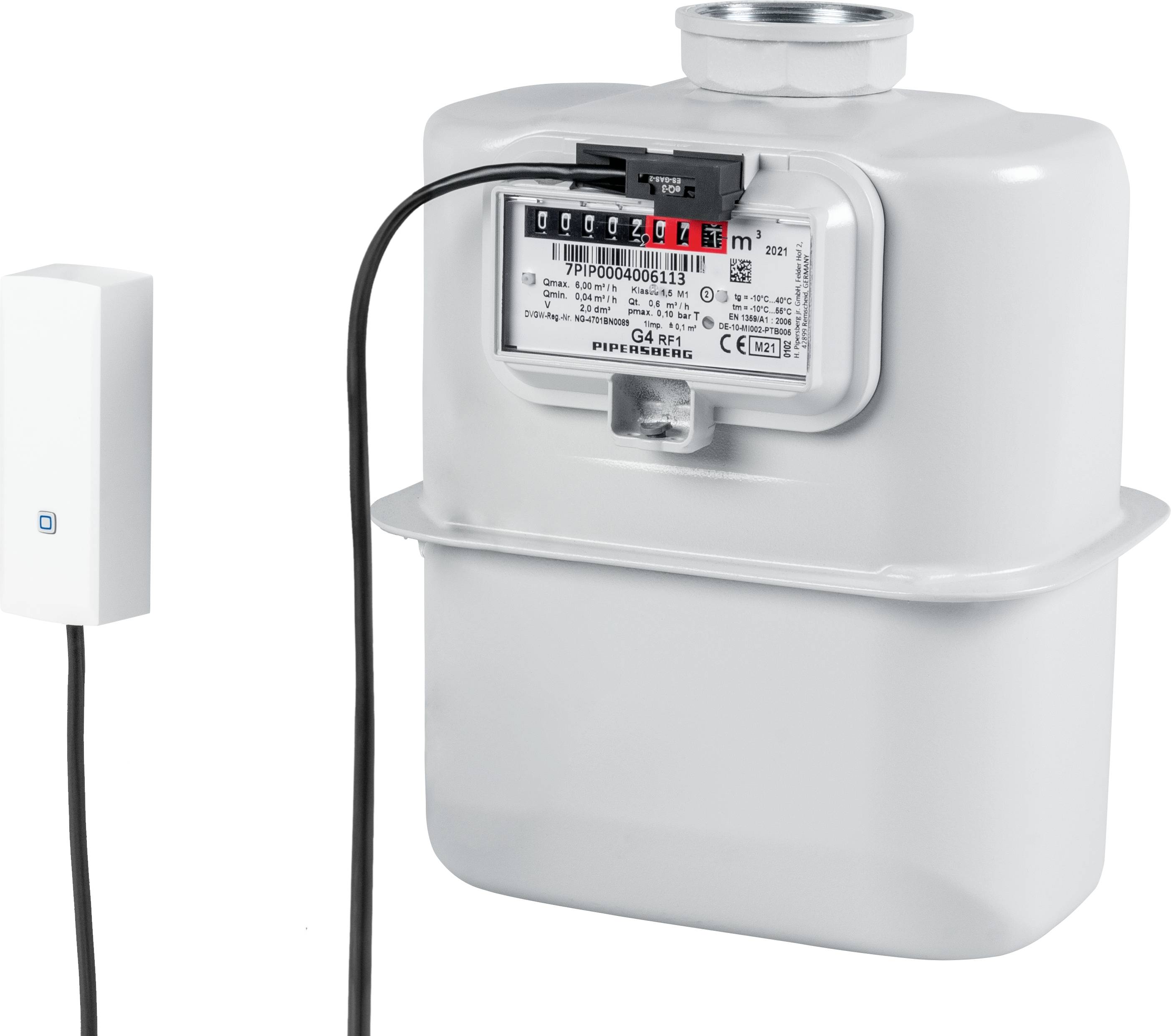 Gas meter and digital reading device, connected by a cable. The gas meter displays consumption in cubic metres.