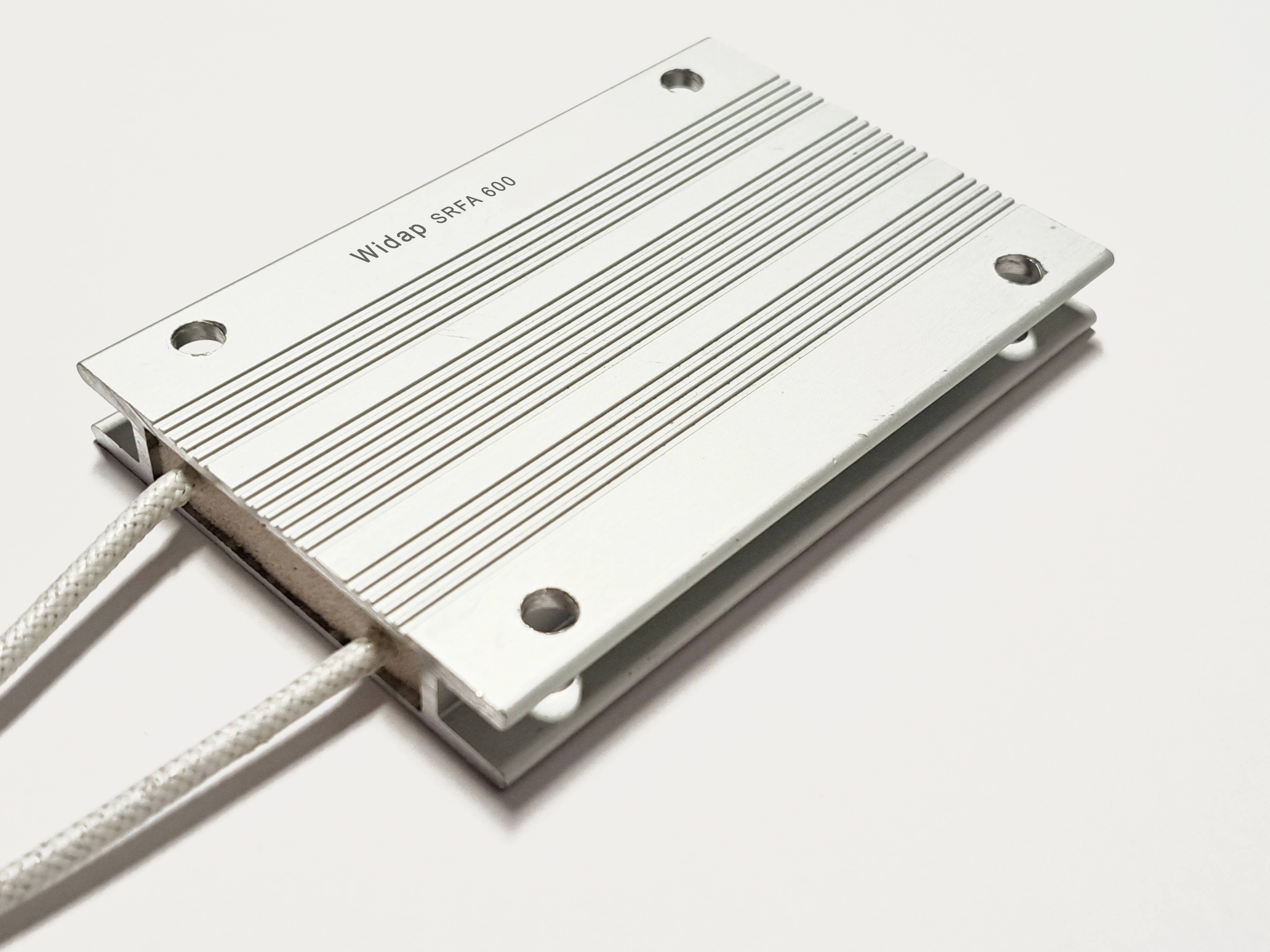 Metallic, rectangular heatsink plate with four screw holes and two protruding cables on a white background.
