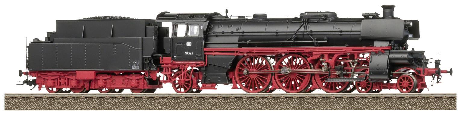 A black and red steam locomotive is standing sideways on railway tracks. Details such as wheels, steam pipes, and the driver's cab are visible.