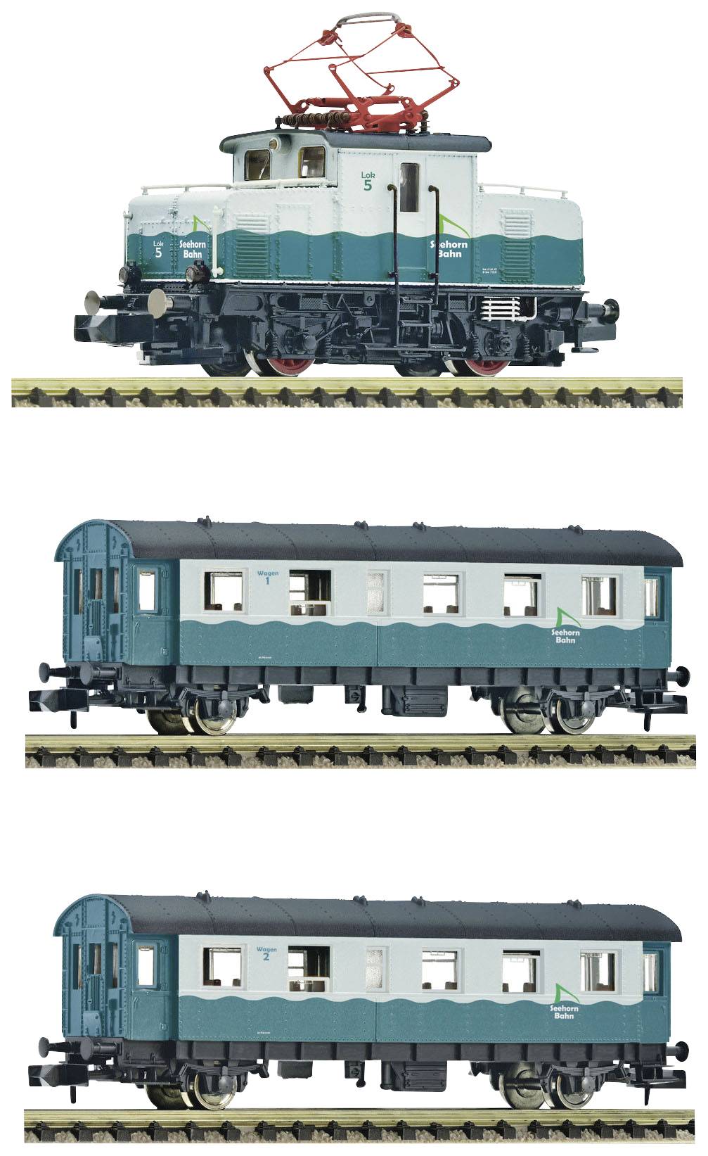 A model train set with an electric locomotive and two carriages on tracks, intricately designed in a historical style.