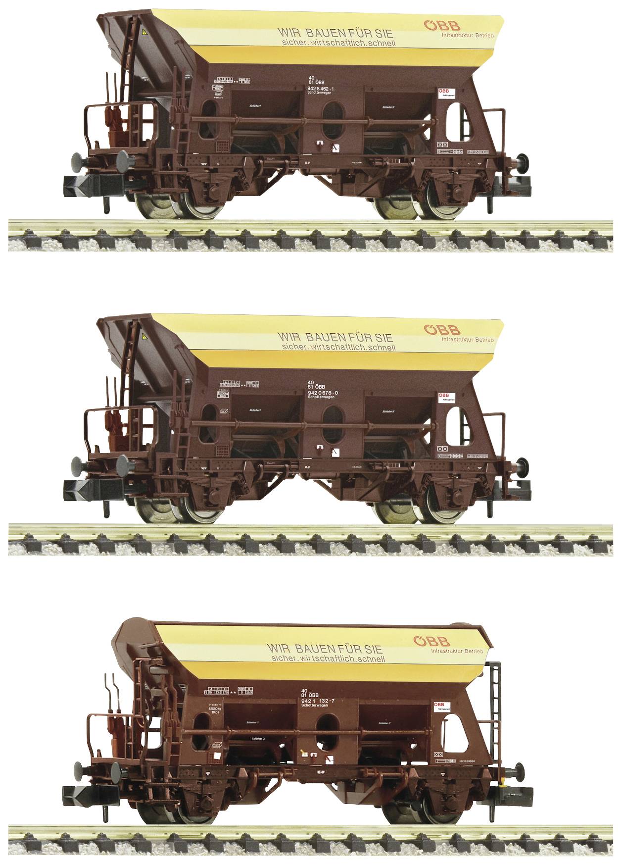 Three yellow and brown freight wagons of ÖBB on railway tracks, with the inscription 'We are building for you'.