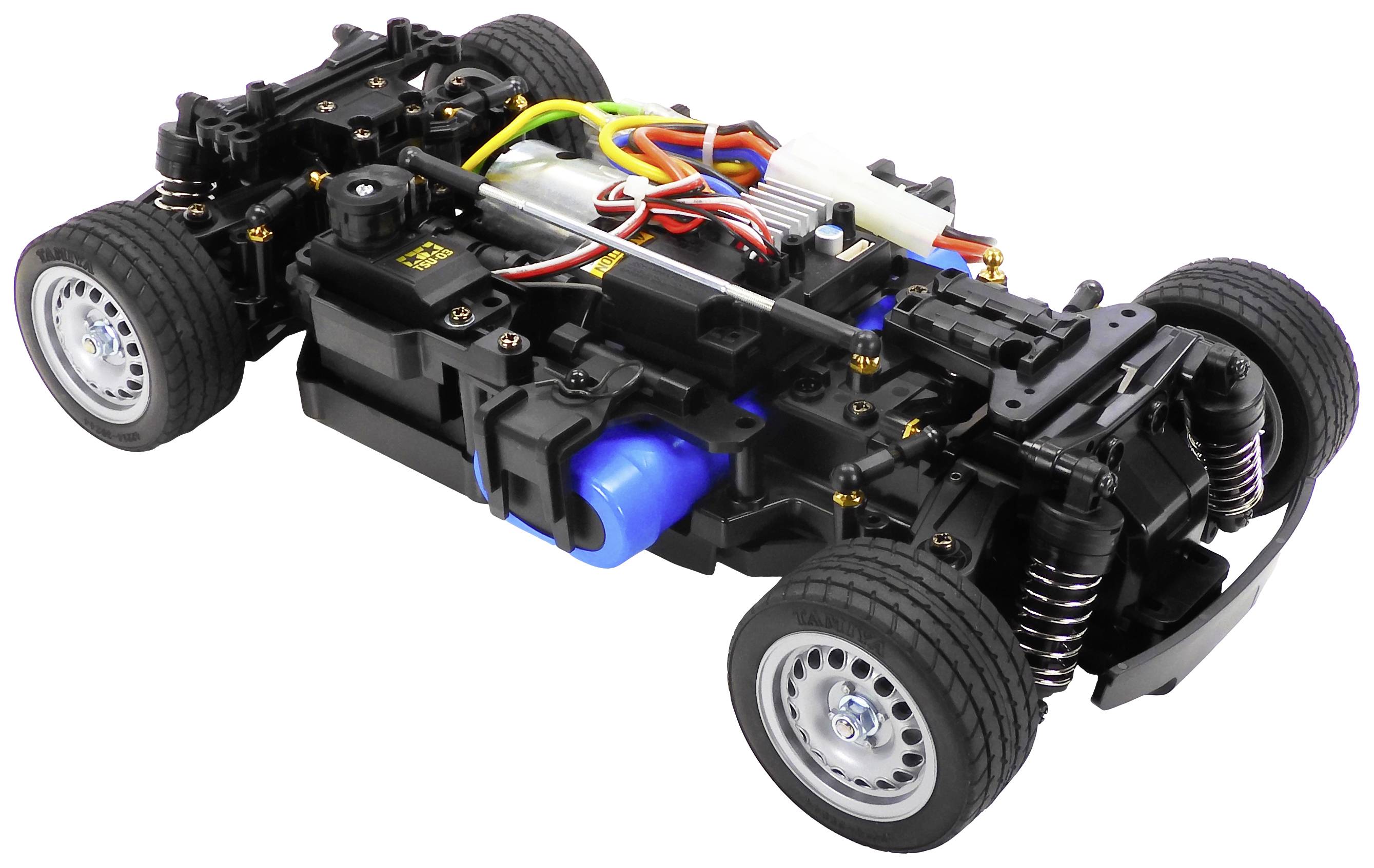 A remote-controlled car chassis with a visible electric motor, wheels, and wiring, ready for further modifications or builds.