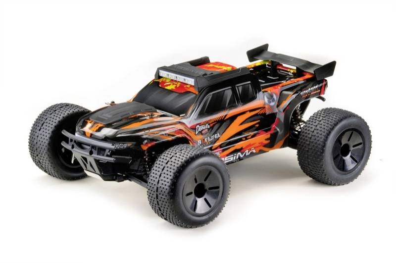 A remote-controlled car with an orange and black flame design. Large tyres and a spoiler suitable for off-road driving.