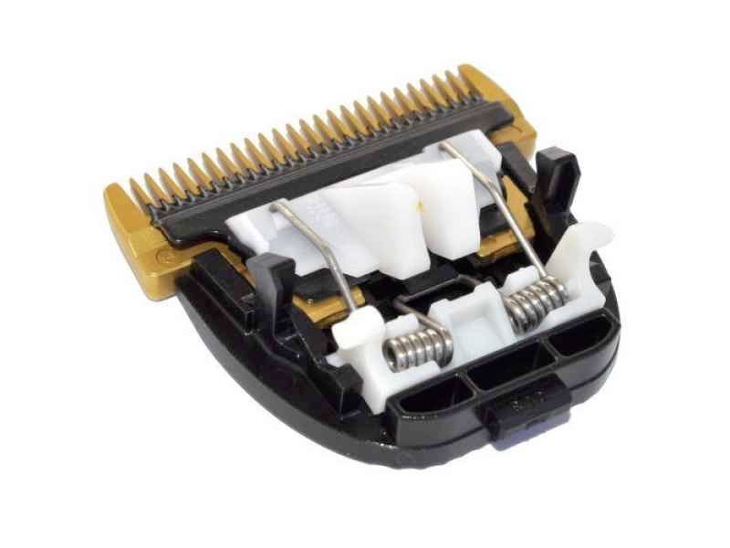 Hair clipper blade. Black and gold blade attachment with springs and plastic components, ready for installation.