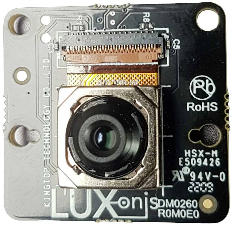Luxonis camera module circuit board, showing lens and electronic circuits. Contains manufacturer information and component codes.