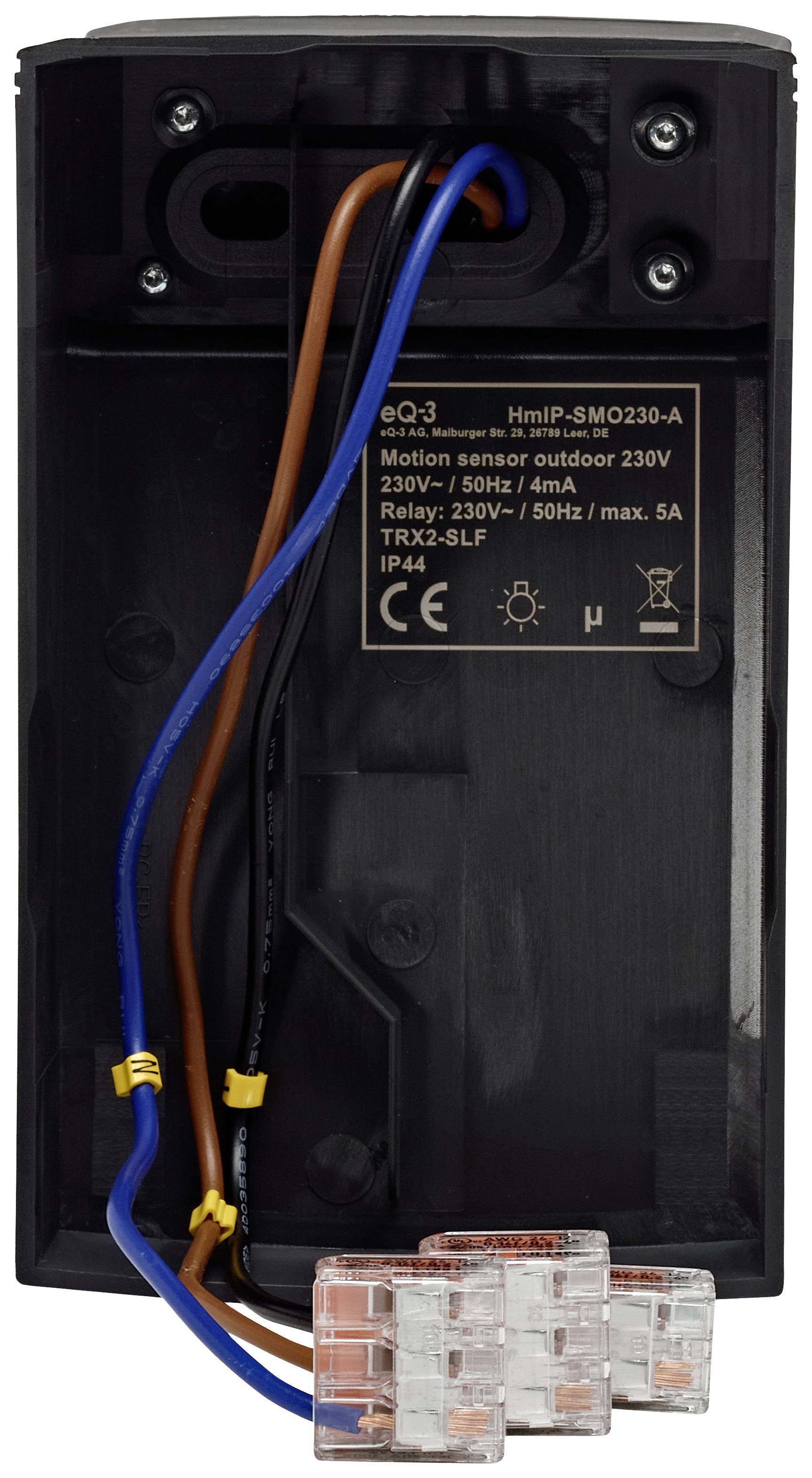 Back of a motion sensor with cable connections. Black housing, technical specifications, and IP44 protection class are visible.
