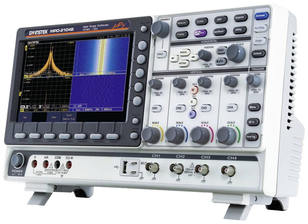 Digital oscilloscope with multi-colour screen, four channel inputs and various controls for signal monitoring and analysis.