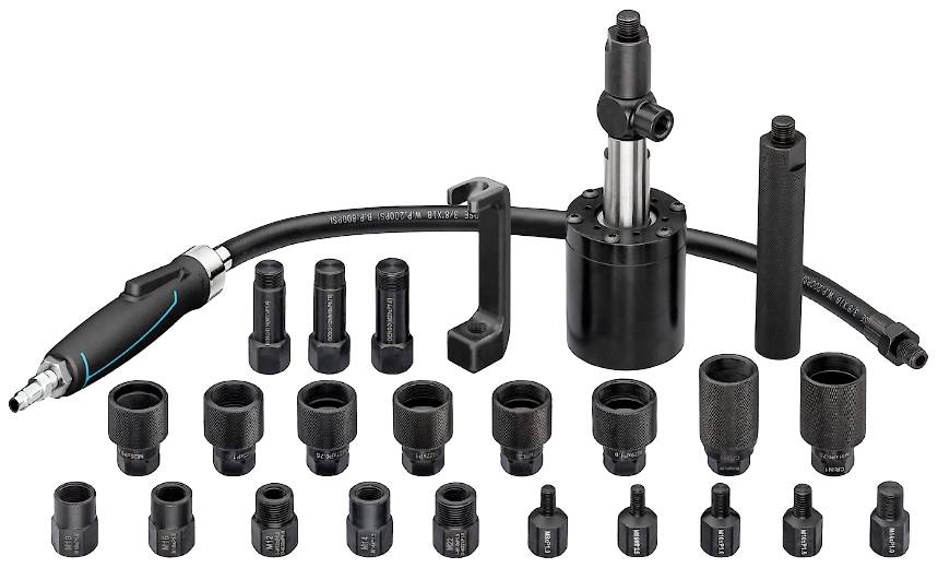 Torque tool set with a hydraulic torque wrench, various sockets, and a hose against a white background.