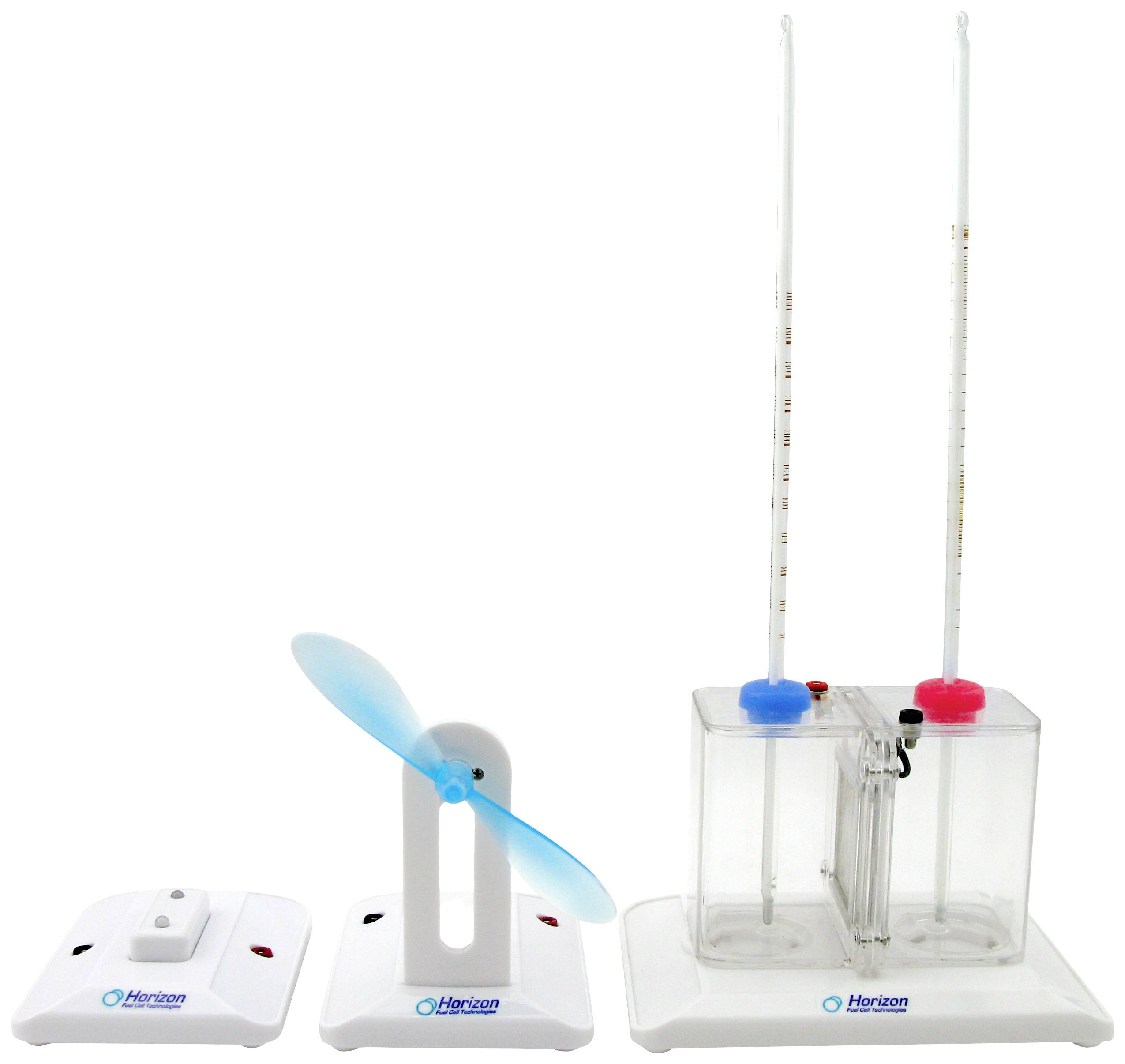 An experimental set featuring two volume measures and a wind turbine model on a white surface, designed for learning about energy conversion.