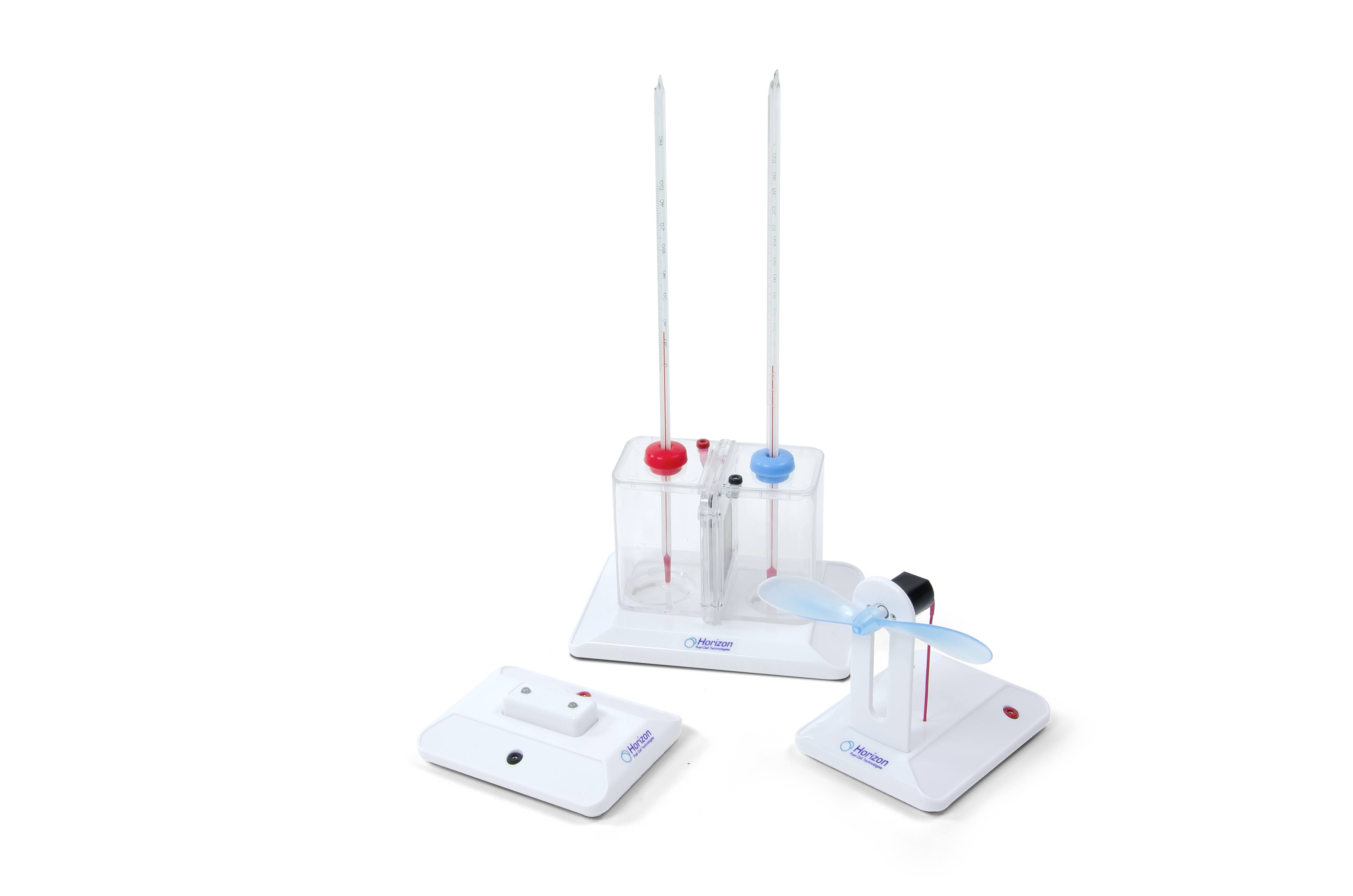 Laboratory equipment set comprising two thermometers, a plastic container, and a white stand with a switch and LED display.