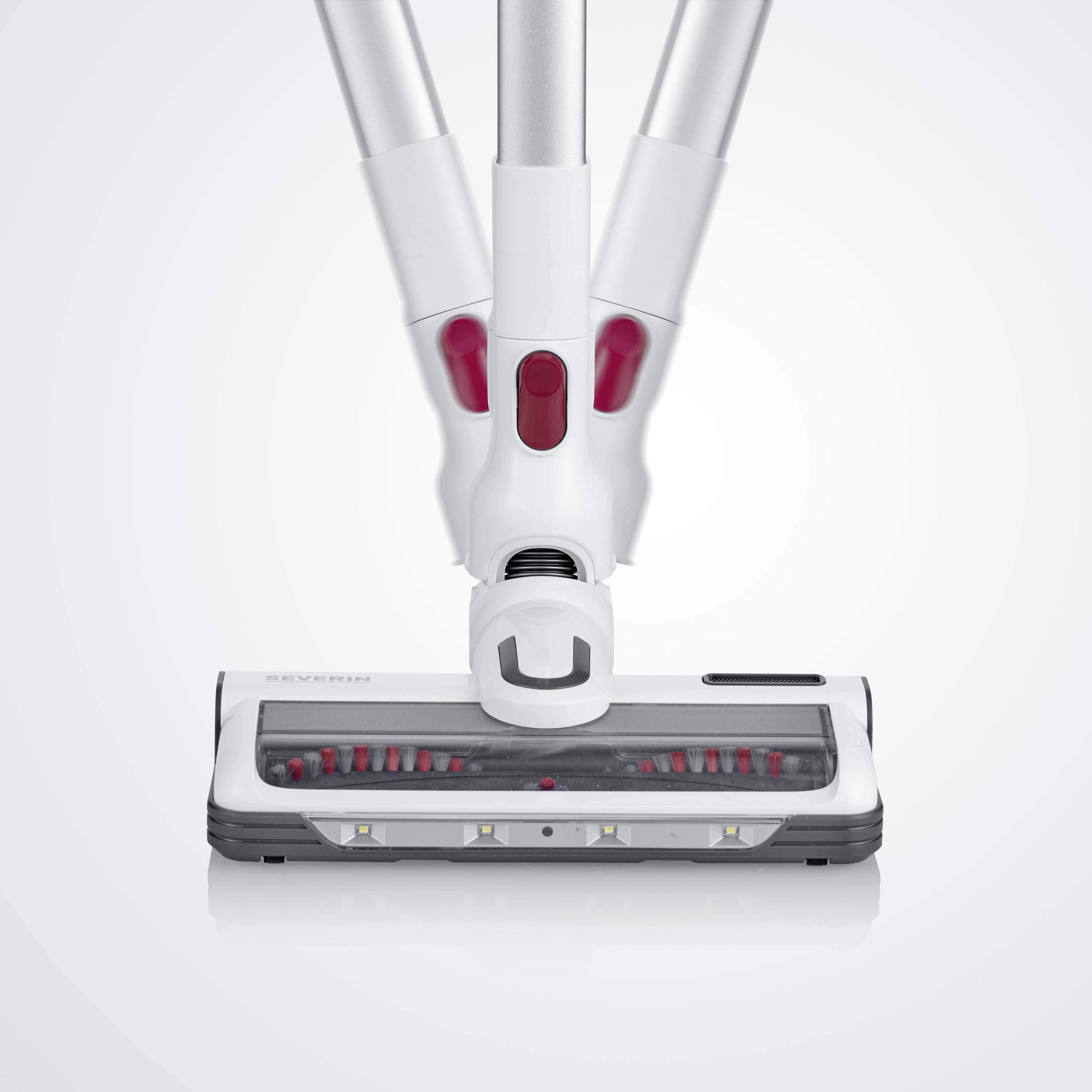 A white vacuum cleaner with a red detail, featuring a slim floor nozzle and a freestanding design, set against a neutral background.
