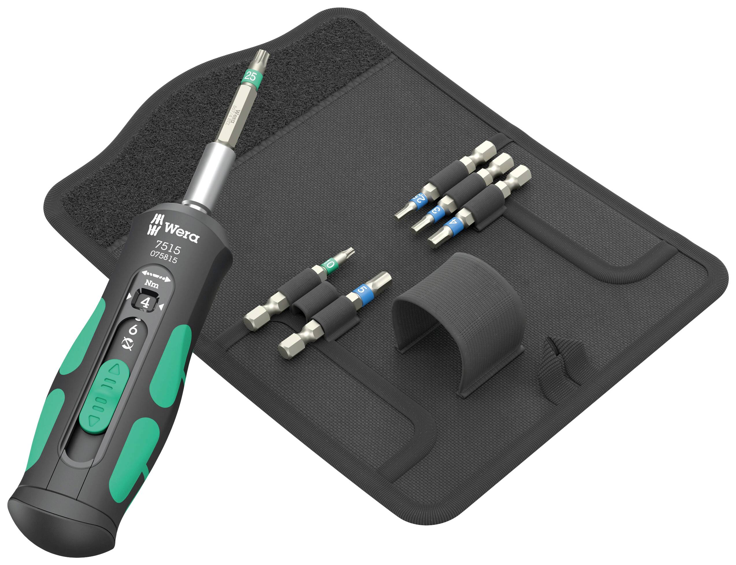 A screwdriver set on a black mat with interchangeable bits. The main screwdriver has a green handle.