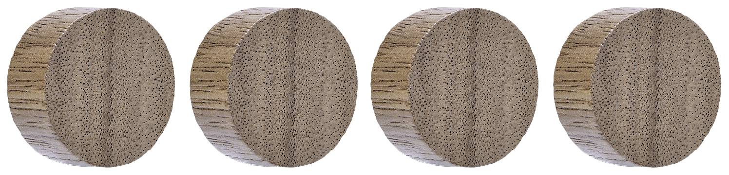 Four identical, round wooden discs arranged in a row.
