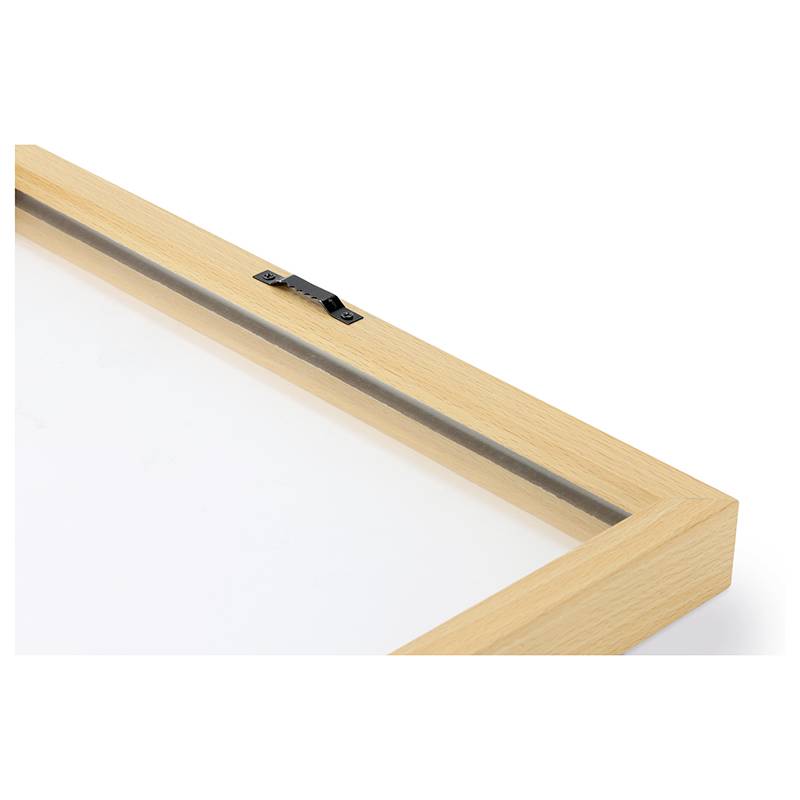 A light wooden picture frame corner piece with glass and metal fittings at the top edge.