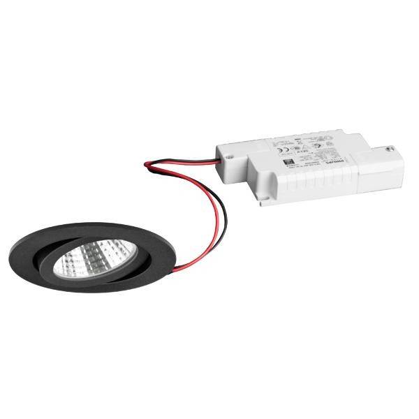 Round, black LED ceiling recessed light set with connected white transformer and red cables. Main light source.