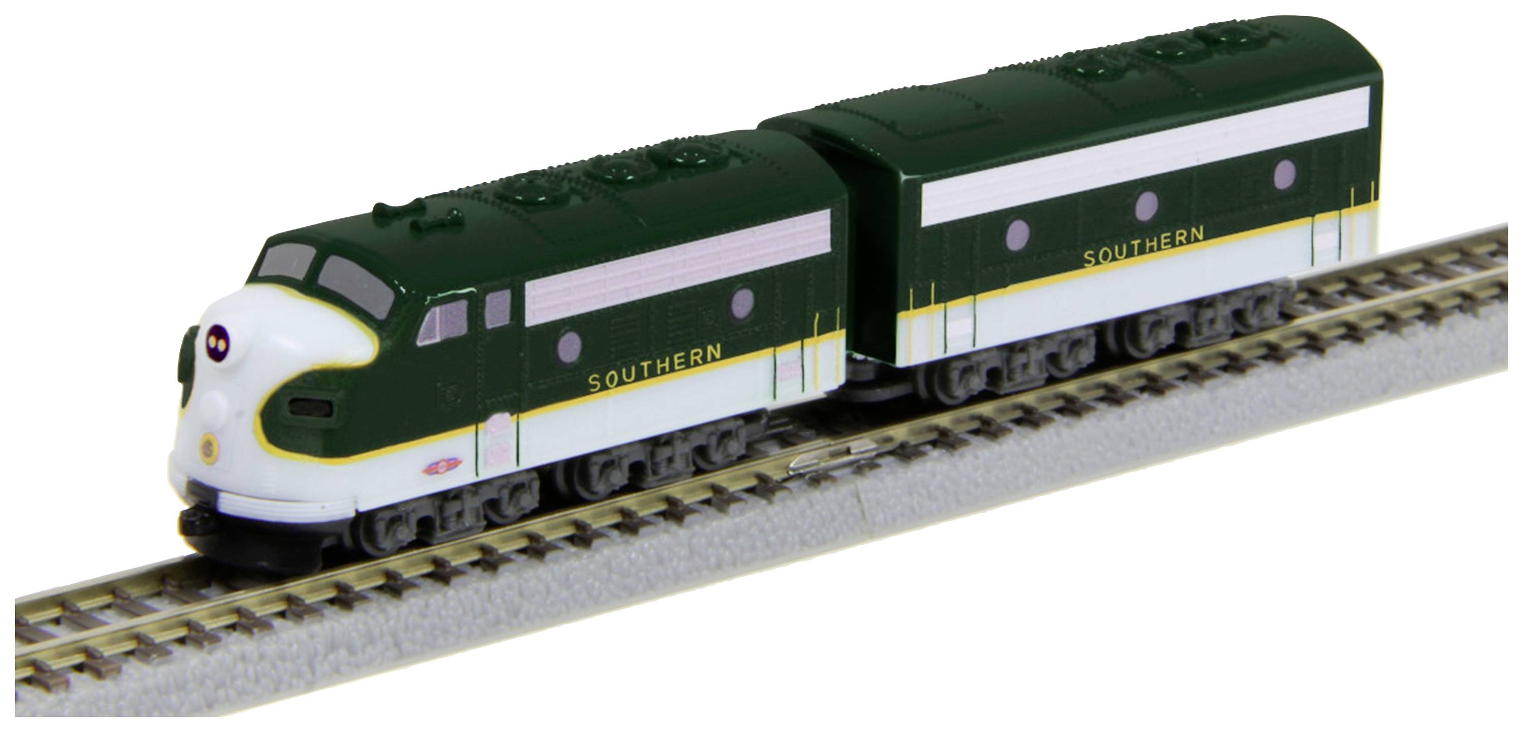 Model railway in green and white with the inscription 'Southern', comprising a locomotive and carriages, on a track.
