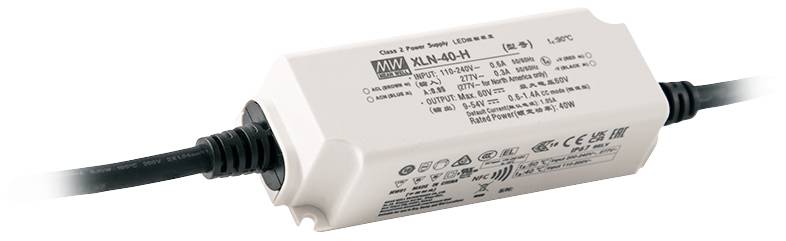 A rectangular power supply unit with printed specifications and safety symbols, positioned between two black cables.