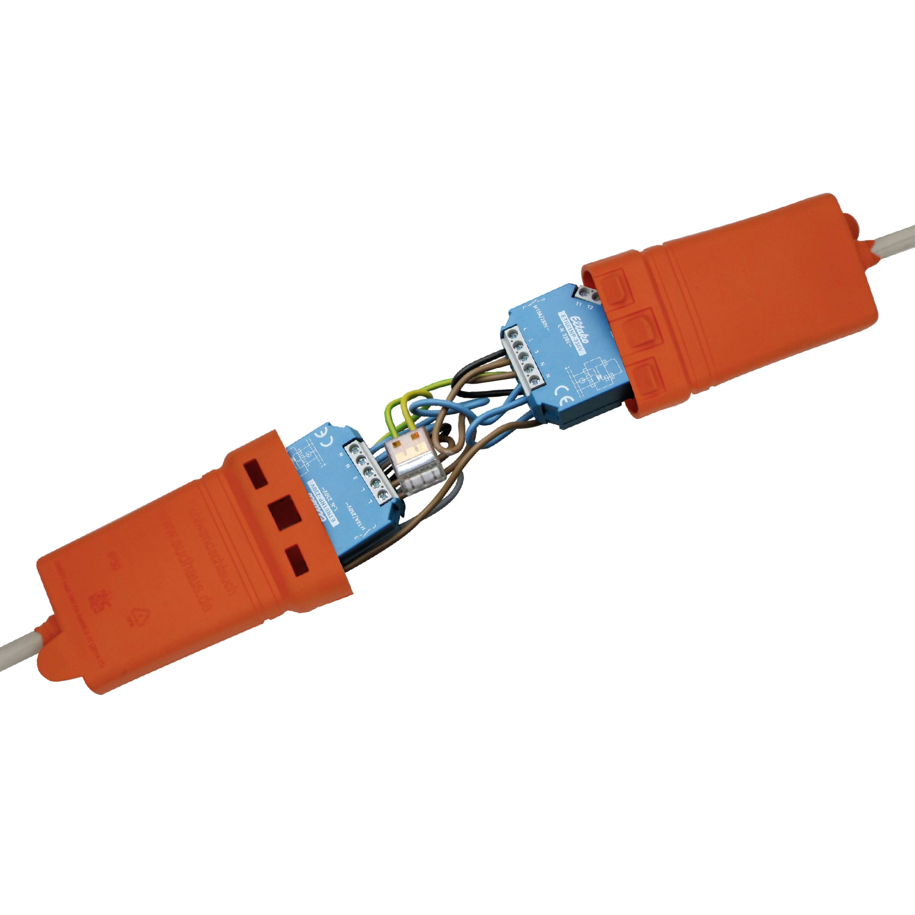 Orange cable connection protection, opened and showing electrical connections inside. Protects and organises cable connections securely.