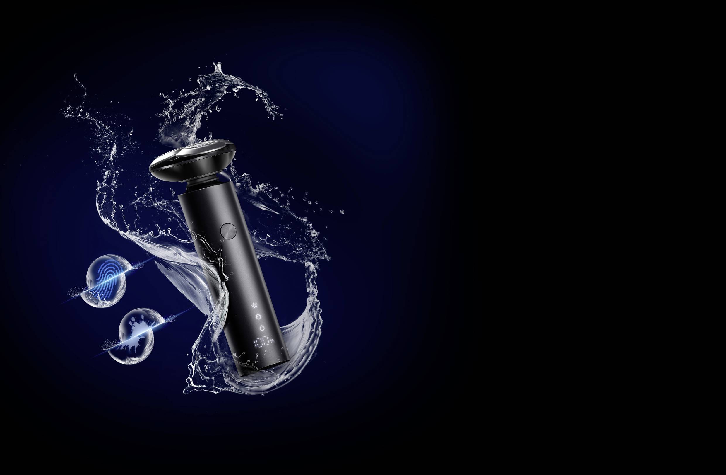 Electric razor in black design with water droplets on a dark blue background, symbolising waterproof capabilities.