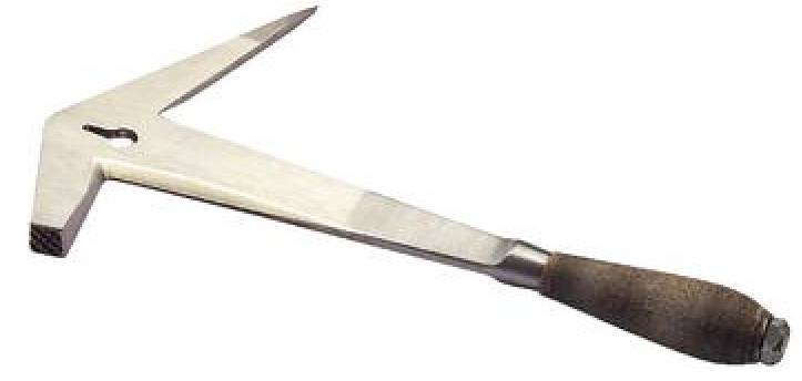 A traditional plastering trowel with a wooden handle, used for creating patterns in fresh plaster.