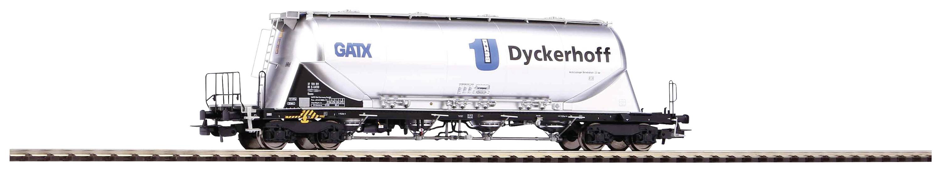 A goods wagon with the inscription 'Dyckerhoff', designed for bulk material transport, on a railway track.