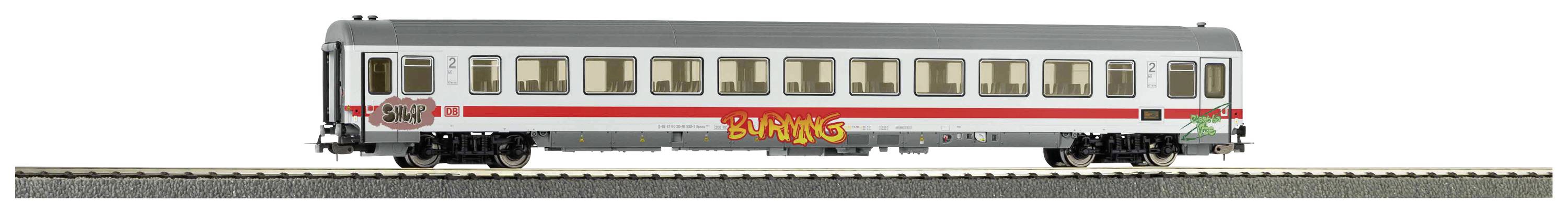 Train model on track with red stripes and large 'Bang' lettering on the side.